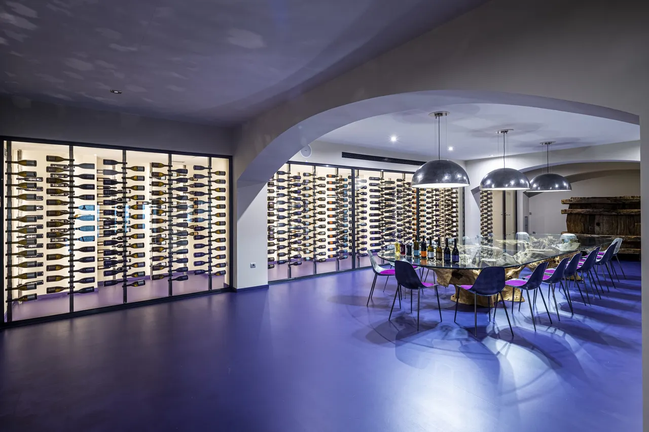 Bóveda dining with bottle wall
